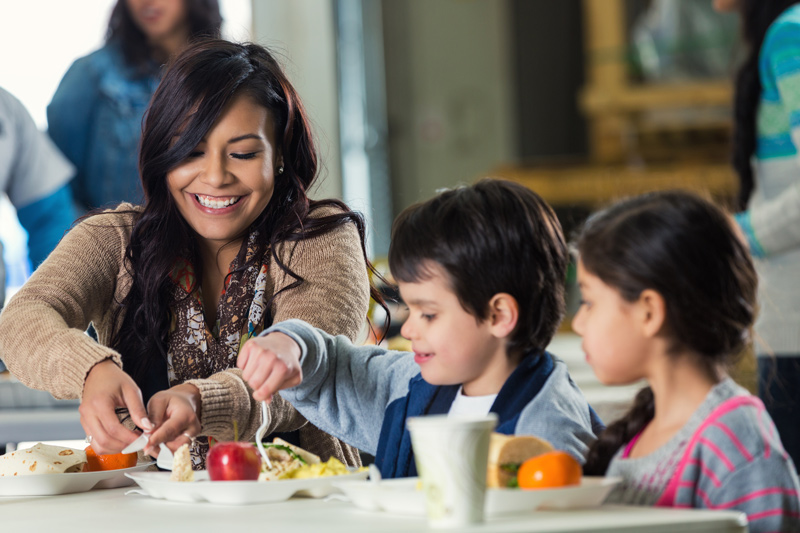 a family making lunch together